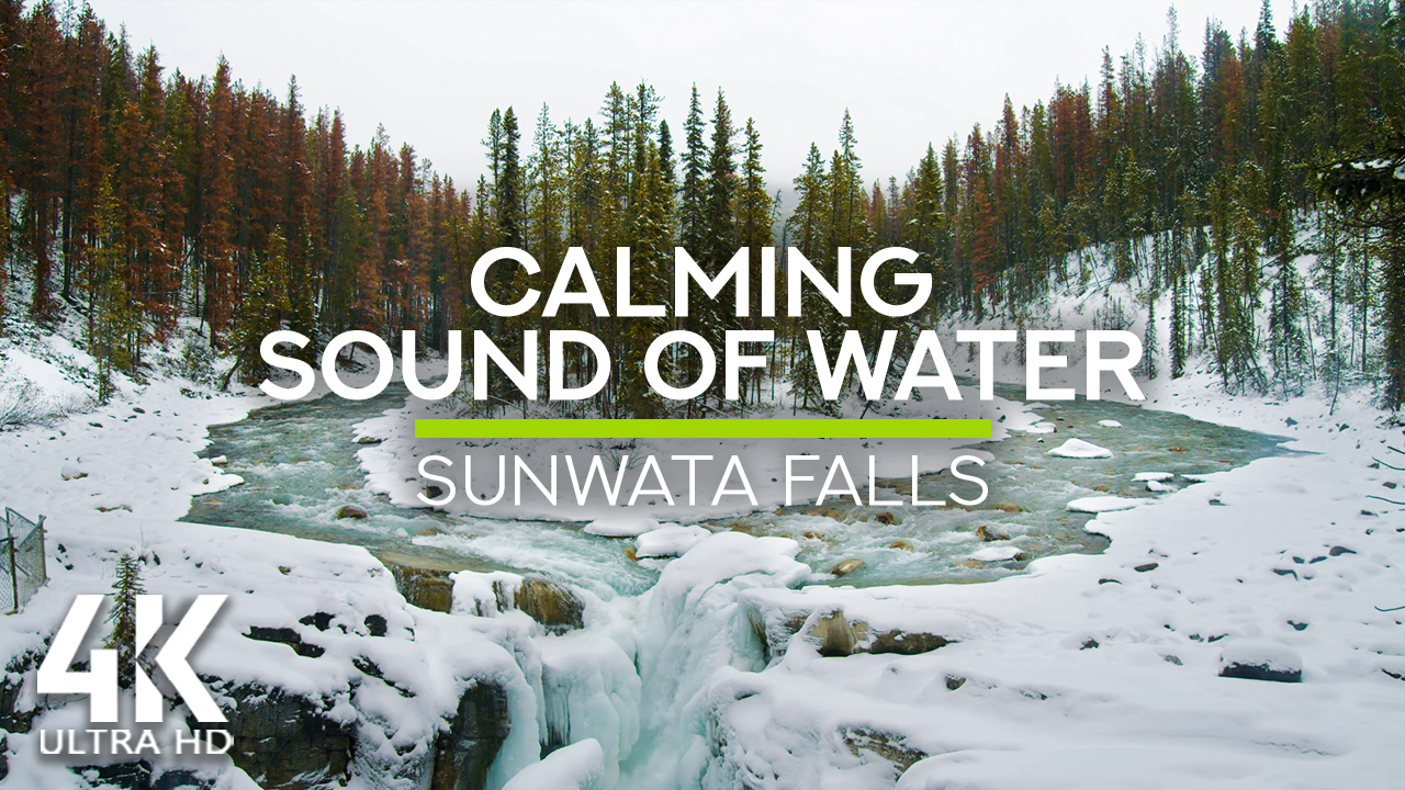 4k_The_Winter_Beauty_of_Ice_Covered_Sunwata_Falls,_Canada,_Jasper